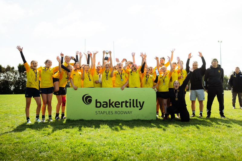 Michaela Blyde Tournament winners celebrate with the trophy